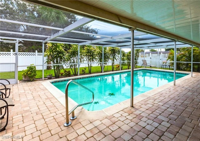 401 NE 14th Pl, Cape Coral, FL 33909 - view of pool with glass enclosure, a fenced backyard, and a patio area
