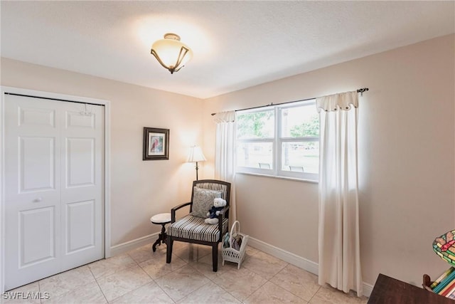 401 NE 14th Pl, Cape Coral, FL 33909 - sitting room featuring baseboards