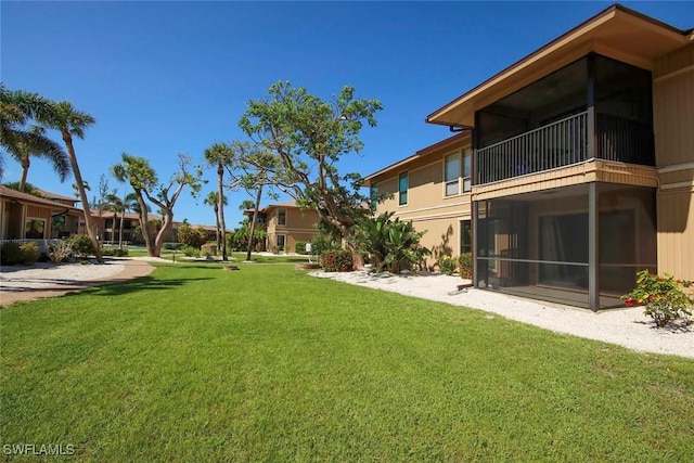 5117 Sea Bell Rd Unit B109, Sanibel, FL 33957 - view of grassy yard featuring a balcony