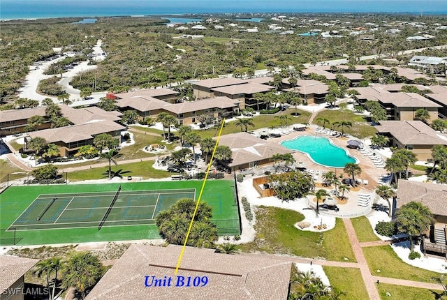 5117 Sea Bell Rd Unit B109, Sanibel, FL 33957 - aerial perspective of suburban area featuring a pool area