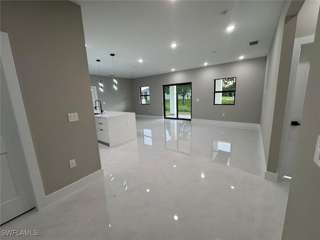 714 Euston Ave S, Lehigh Acres, FL 33974 - unfurnished room with a smoke detector and recessed lighting