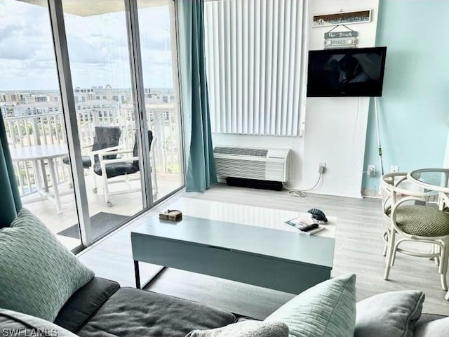 7330 Estero Blvd Unit 1107, Fort Myers Beach, FL 33931 - living area with wood finished floors and a wall of windows