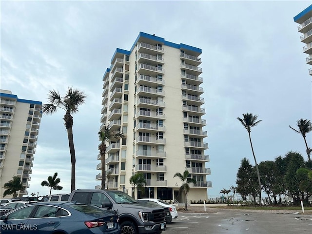 7330 Estero Blvd Unit 1107, Fort Myers Beach, FL 33931 - view of apartment building / complex featuring uncovered parking