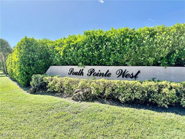 13118 Feather Sound Dr Unit 208, Fort Myers, FL 33919 - community sign with a yard