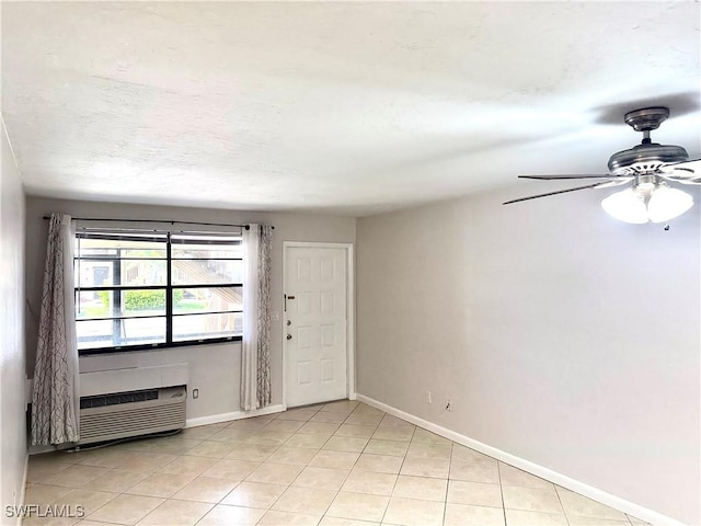 13118 Feather Sound Dr Unit 208, Fort Myers, FL 33919 - empty room with a ceiling fan and light tile patterned floors