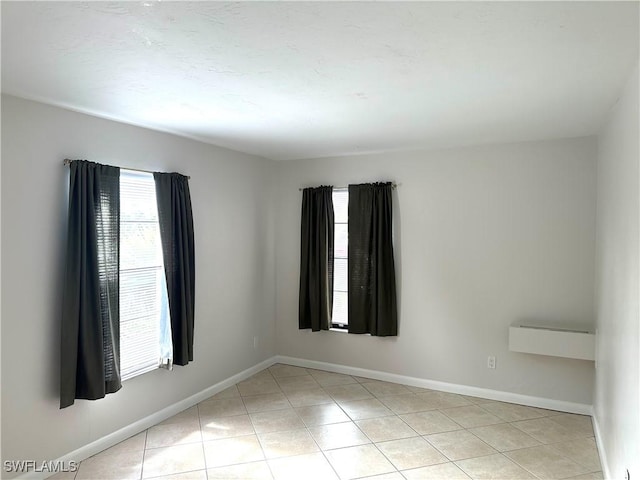 13118 Feather Sound Dr Unit 208, Fort Myers, FL 33919 - empty room with light tile patterned floors