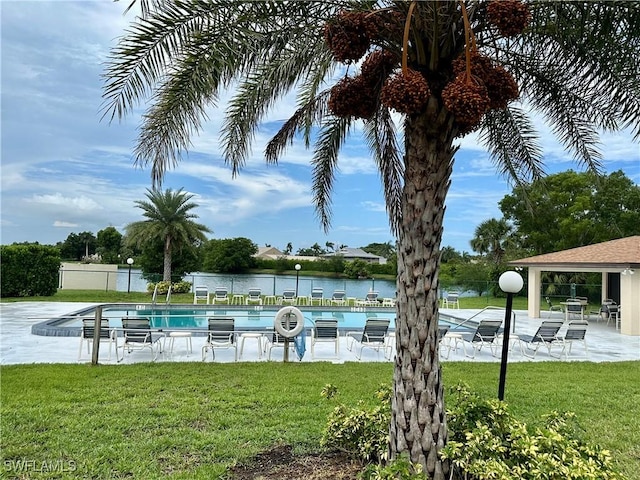 13118 Feather Sound Dr Unit 208, Fort Myers, FL 33919 - community pool featuring a patio