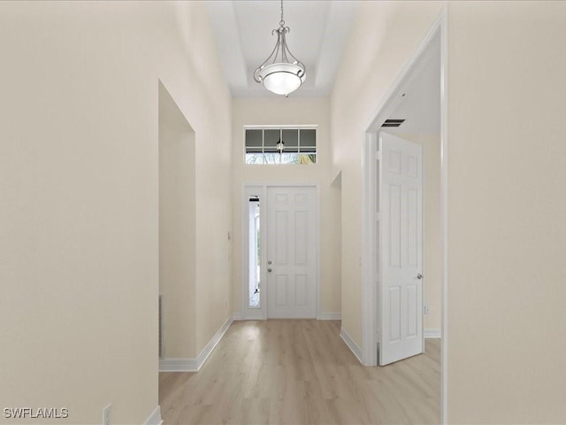 6491 Marbella Dr, Naples, FL 34105 - entrance foyer featuring wood finished floors and a towering ceiling