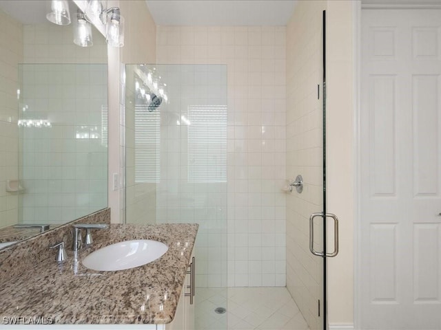 6491 Marbella Dr, Naples, FL 34105 - bathroom featuring a shower stall and vanity