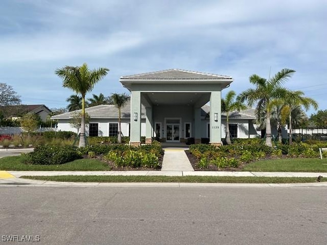 1023 Enbrook Loop, Naples, FL 34114 - back of house featuring french doors