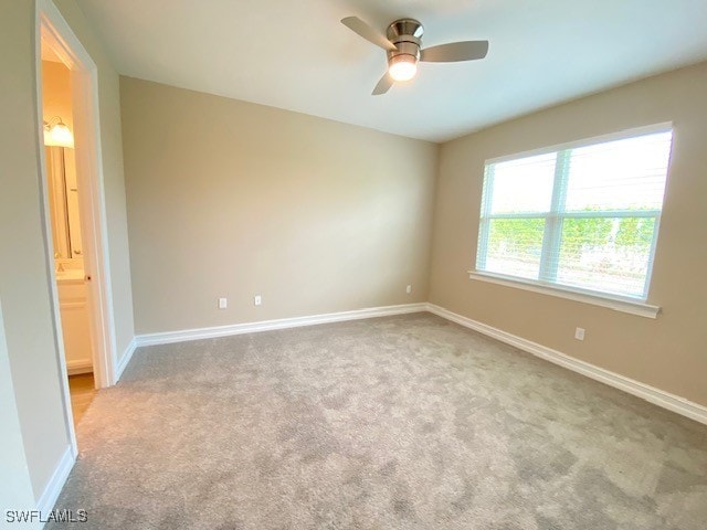 1023 Enbrook Loop, Naples, FL 34114 - carpeted spare room with a ceiling fan and baseboards