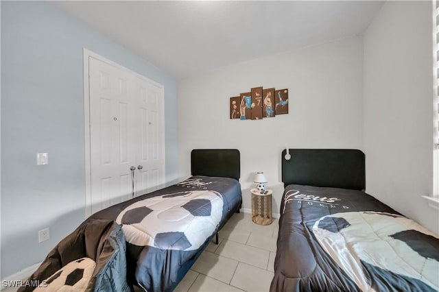 1421 SW 13th Ter, Cape Coral, FL 33991 - tiled bedroom with a closet