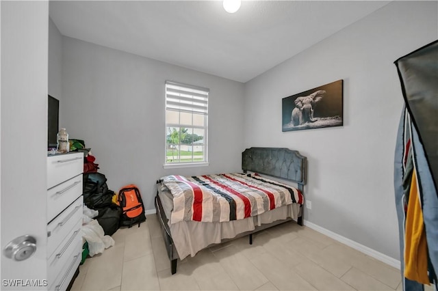 1421 SW 13th Ter, Cape Coral, FL 33991 - bedroom featuring baseboards
