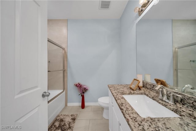 1421 SW 13th Ter, Cape Coral, FL 33991 - bathroom featuring vanity, tile patterned floors, and bath / shower combo with glass door