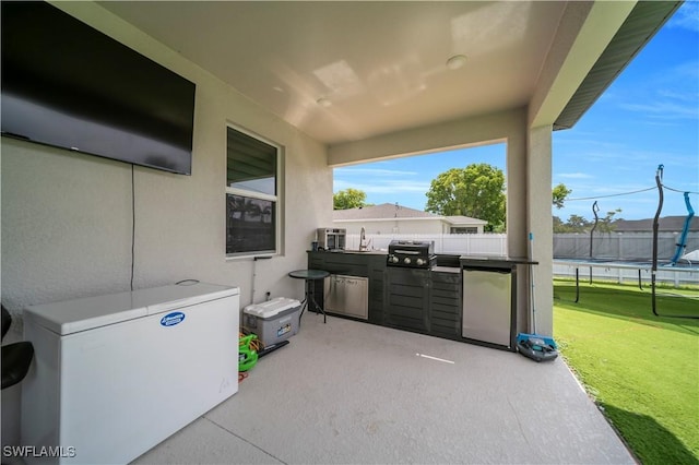 1421 SW 13th Ter, Cape Coral, FL 33991 - view of patio with exterior kitchen and a sink