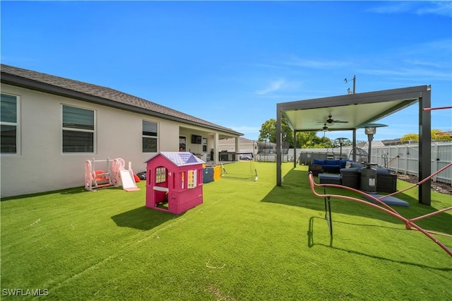 1421 SW 13th Ter, Cape Coral, FL 33991 - fenced backyard featuring an outdoor living space and ceiling fan