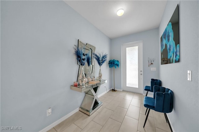1421 SW 13th Ter, Cape Coral, FL 33991 - entrance foyer with baseboards and tile patterned floors