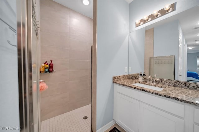 1421 SW 13th Ter, Cape Coral, FL 33991 - full bath featuring vanity, a tile shower, and ensuite bath