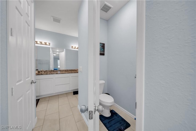 1421 SW 13th Ter, Cape Coral, FL 33991 - bathroom with vanity and tile patterned floors