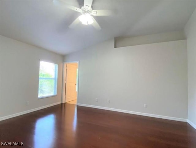 4839 18th St NE Unit 1, Naples, FL 34120 - unfurnished bedroom with wood finished floors, vaulted ceiling, and ceiling fan