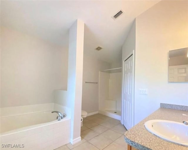 4839 18th St NE Unit 1, Naples, FL 34120 - bathroom featuring a stall shower, vanity, a garden tub, and tile patterned floors