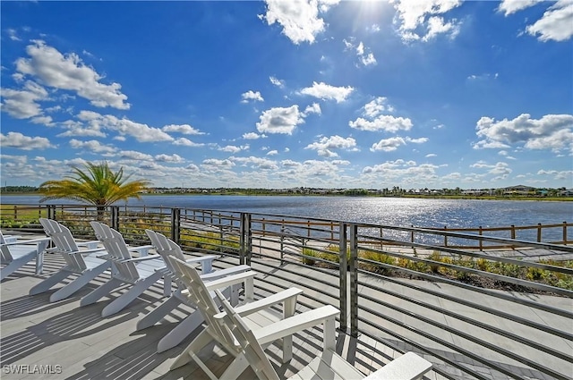 4577 Centaurus Cir, Naples, FL 34120 - wooden terrace with a water view