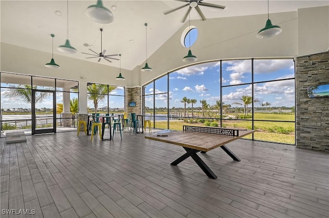 4577 Centaurus Cir, Naples, FL 34120 - unfurnished sunroom featuring vaulted ceiling and a water view