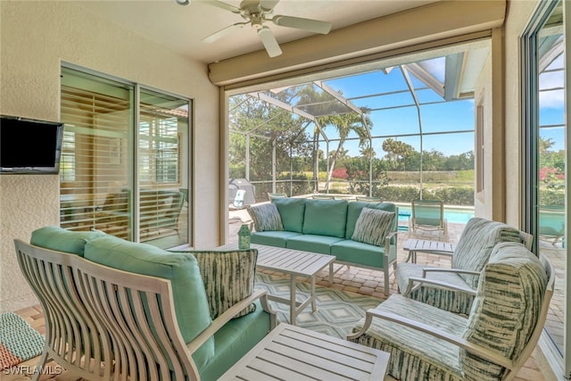 14642 Speranza Way, Bonita Springs, FL 34135 - sunroom / solarium featuring an outdoor hangout area, ceiling fan, and healthy amount of natural light