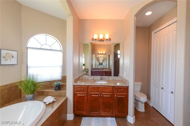 3606 Whippoorwill Blvd, Punta Gorda, FL 33950 - full bathroom with a bath, vanity, a closet, and tile patterned flooring