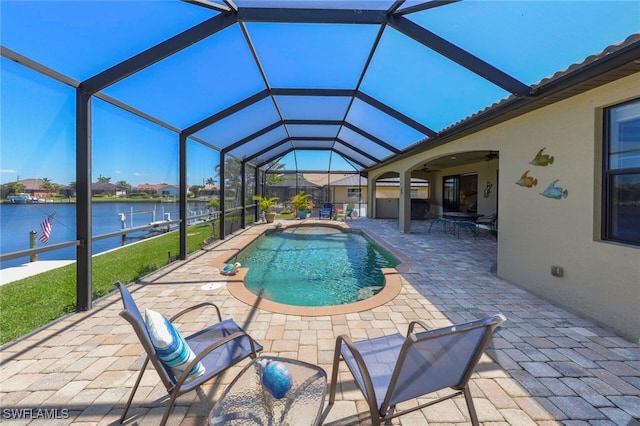 3606 Whippoorwill Blvd, Punta Gorda, FL 33950 - outdoor pool featuring a patio, a water view, a lanai, and a ceiling fan