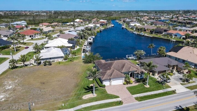 3606 Whippoorwill Blvd, Punta Gorda, FL 33950 - aerial perspective of suburban area with a large body of water