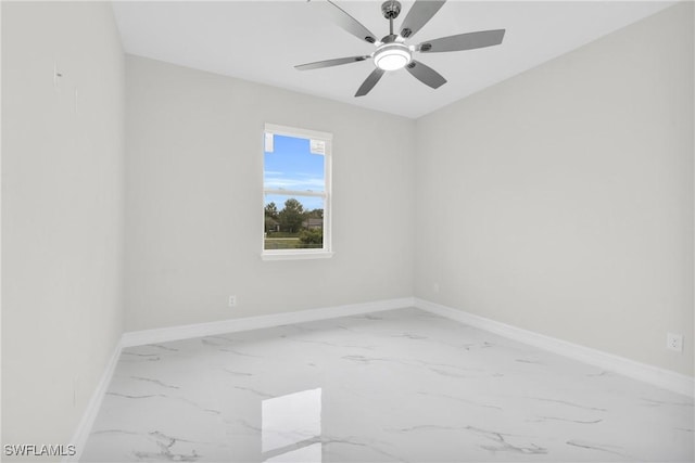2718 42nd St W, Lehigh Acres, FL 33971 - empty room featuring marble finish floors and a ceiling fan