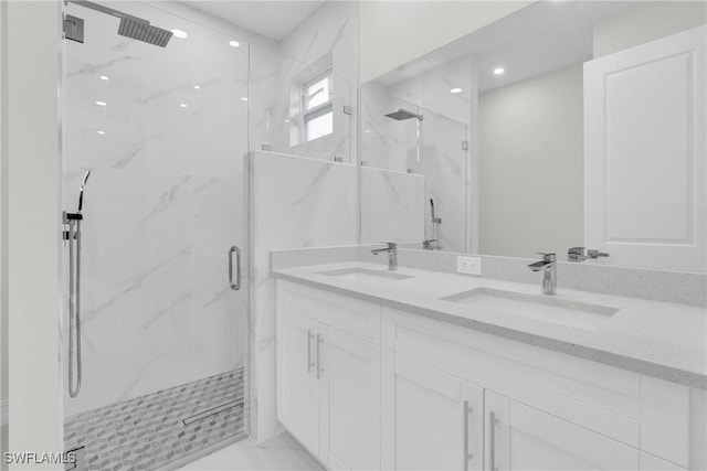 2718 42nd St W, Lehigh Acres, FL 33971 - full bathroom with a marble finish shower, double vanity, recessed lighting, and marble finish floors