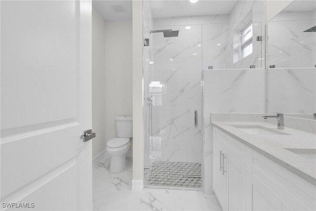 2718 42nd St W, Lehigh Acres, FL 33971 - bathroom with marble finish floors, a marble finish shower, and double vanity