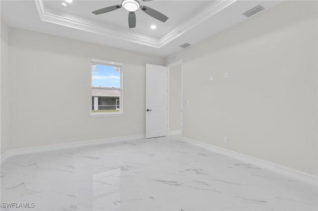 2718 42nd St W, Lehigh Acres, FL 33971 - unfurnished room with a raised ceiling, crown molding, marble finish floors, a ceiling fan, and recessed lighting