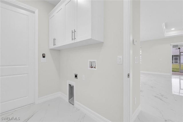 2718 42nd St W, Lehigh Acres, FL 33971 - laundry area with cabinet space, light marble finish floors, electric dryer hookup, hookup for a washing machine, and recessed lighting