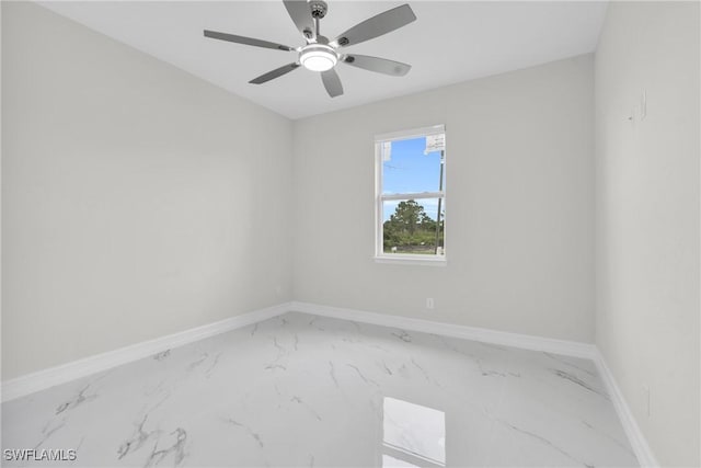 2718 42nd St W, Lehigh Acres, FL 33971 - unfurnished room featuring marble finish flooring and ceiling fan