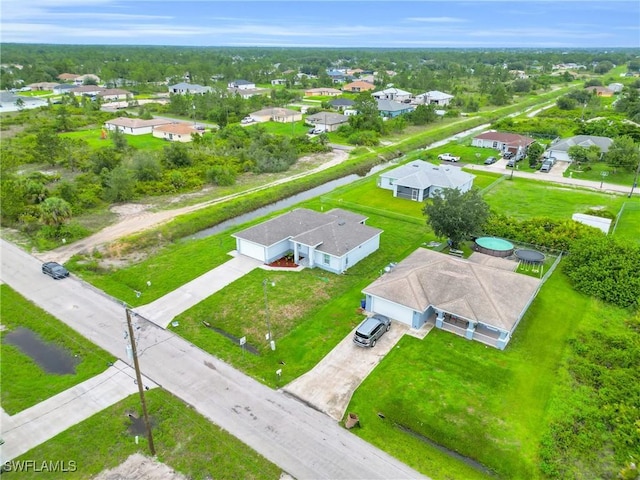 2718 42nd St W, Lehigh Acres, FL 33971 - aerial perspective of suburban area