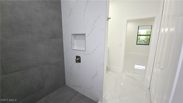 3124 40th St SW, Lehigh Acres, FL 33976 - bathroom with marble tiled floors and baseboards