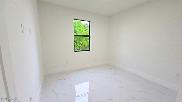 3124 40th St SW, Lehigh Acres, FL 33976 - empty room with light marble finish flooring