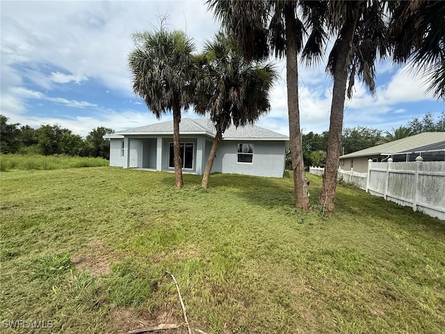 6050 Langdon Ave, Fort Myers, FL 33905 - back of property with stucco siding