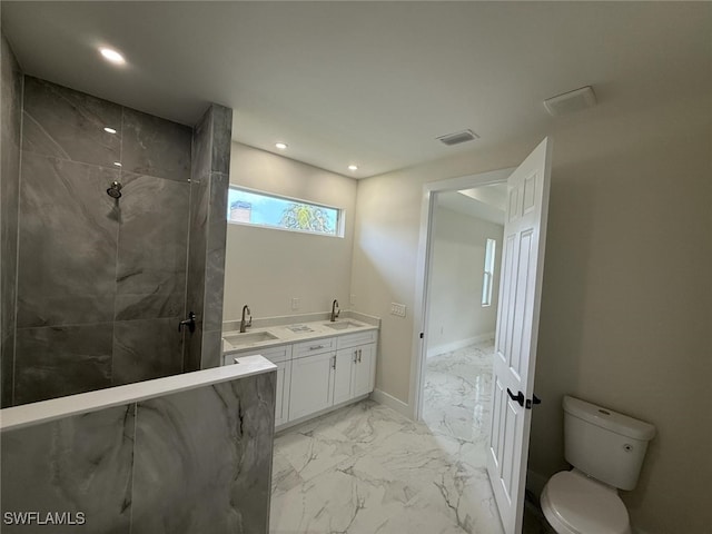 6050 Langdon Ave, Fort Myers, FL 33905 - full bath with marble look tile flooring, a marble finish shower, double vanity, and recessed lighting