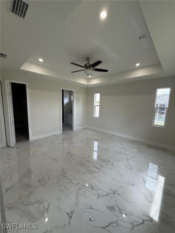 6050 Langdon Ave, Fort Myers, FL 33905 - unfurnished room featuring a tray ceiling, a ceiling fan, and recessed lighting
