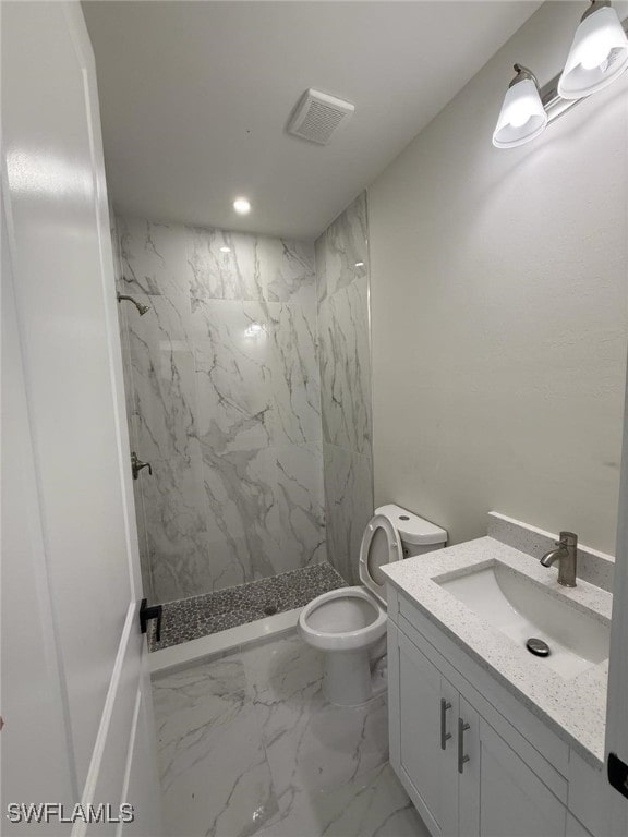 3832 Insdale St, Fort Myers, FL 33905 - bathroom with vanity, a marble finish shower, and marble finish floors