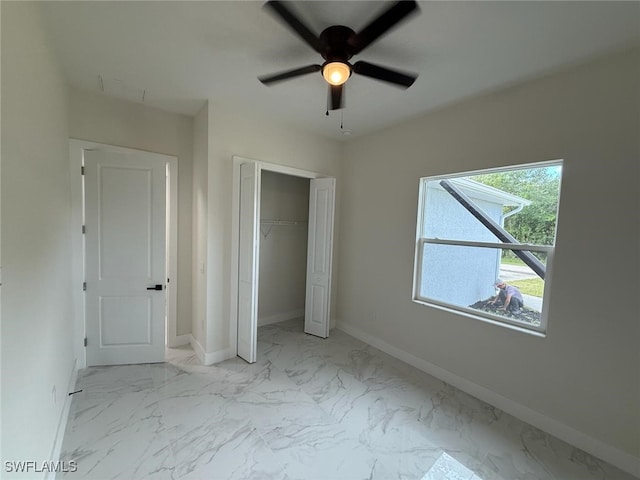 3832 Insdale St, Fort Myers, FL 33905 - unfurnished bedroom featuring marble finish flooring, a closet, and ceiling fan