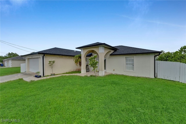 3031 36th St SW, Lehigh Acres, FL 33976 - single story home with concrete driveway, stucco siding, an attached garage, and a shingled roof