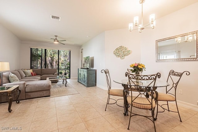 7907 Bristol Cir, Naples, FL 34120 - living room with a chandelier, a ceiling fan, and light tile patterned flooring
