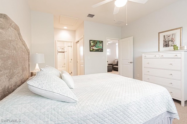7907 Bristol Cir, Naples, FL 34120 - carpeted bedroom with ensuite bathroom and a ceiling fan