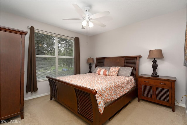 11500 Villa Grand Unit 310, Fort Myers, FL 33913 - bedroom with light carpet and a ceiling fan
