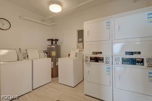 7360 Estero Blvd Unit 703, Fort Myers Beach, FL 33931 - shared laundry room with washer and dryer and water heater